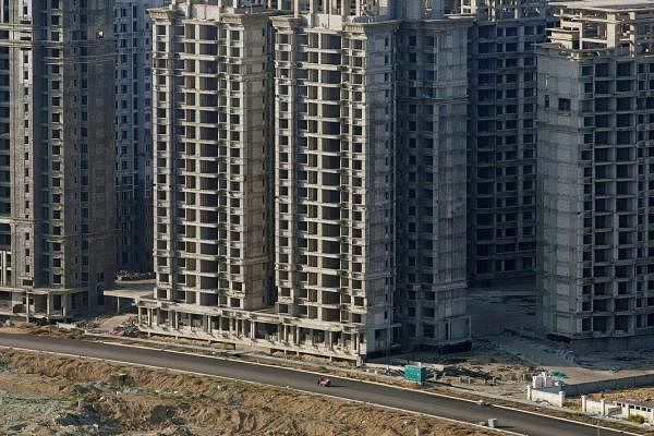 Chinese developers' debt woes worsen as sales, yuan weaken, Property - THE  BUSINESS TIMES