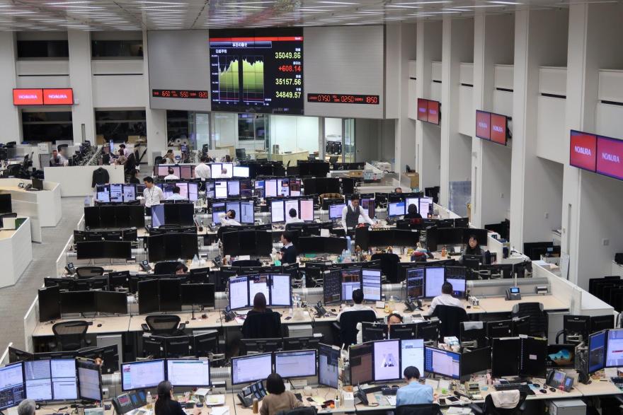 Japan’s Nikkei pushes to 34-year peak as chip shares climb