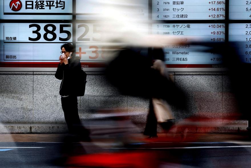 Asia: Stocks struggle even as China slashes rates
