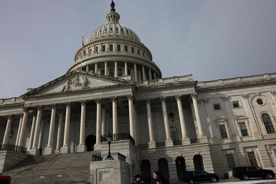 US lawmakers approve stopgap bill to avert government shutdown, International