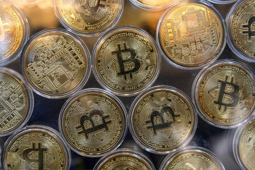 Bitcoin tops US,000 for the first time as rally builds steam