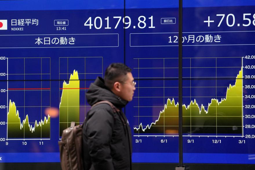 Tokyo: Shares open 2.05% higher as yen slides